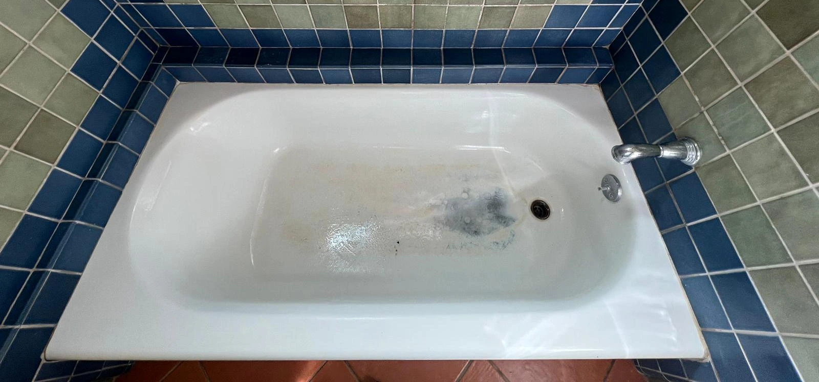 Before reglazing - faded bathtub