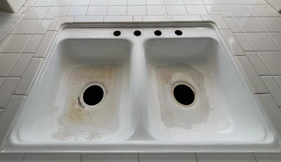 Bathroom vanity sink before reglazing